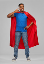 Super Power And People Concept - Happy Smiling Indian Man In Red Superhero Cape Making Phone Call Gesture Over Grey Background