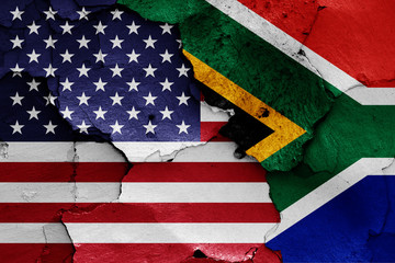 Wall Mural - flags of USA and South Africa painted on cracked wall