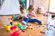 © Krakenimages.com - Adorable toddlers playing meals using plastic food and cutlery toy at kindergarten