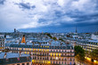 Dramatic sky with storm clouds over Paris, aerial panorama of Paris, France