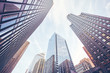 © MaciejBledowski - Looking up at Chicago skyscrapers, color toning applied, USA.
