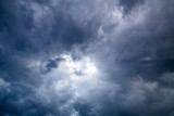 Fototapeta Niebo - dark cloudy sky above sea before storm is coming
