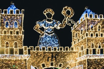 Wall Mural - Illuminated castle with Christmas decorations on black background in Magdeburg, Germany