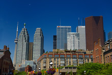St Lawrence Market And Gooderham Flatiron Building With CN Tower And Financial District Bank Towers Toronto At Half Moon