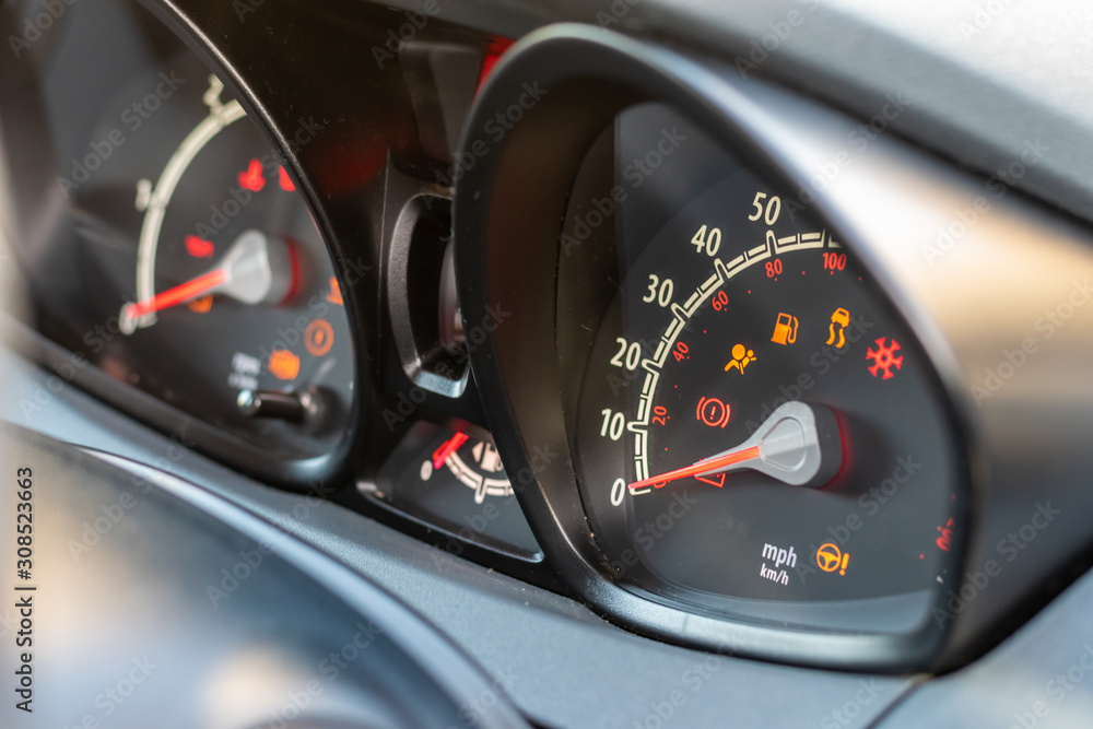 Revving Instrumentation Panel Dynamic angle of a vehicle instrument panel/binnacle, showing a blurred ...