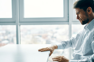 Wall Mural - man using digital tablet in hotel room