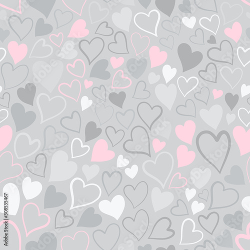 Romantic seamless pattern with cute images of hearts on a gray background. Th...