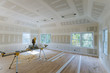 © Cavan Images - Drywall finish building industry new home construction interior
