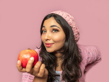 Young Woman With Red Pomegranate Fruit