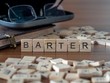 barter the word or concept represented by wooden letter tiles