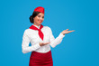 Cheerful flight attendant representing airline