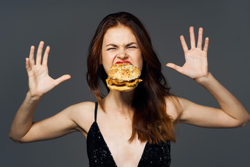 portrait of young woman eating cake