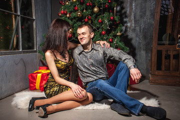 Wall Mural - couple in love Christmas tree with gifts