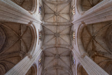 Majestic Pointed Arches, Piers, Triforium, Clerestory, Ribbed Vaulting, Nave Lancet Opening In Batalha Monastery A Masterpiece Of Portuguese Gothic Architecture