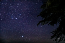 A Starry November Night In South East Asia By The Shore Of A Pristine White Sandy Beach