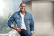© elnariz - Casual lifestyle portrait of an african american male with perfect white teeth smile, commercial model