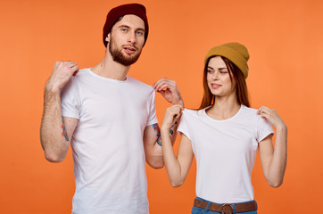 young couple in t-shirts chatting