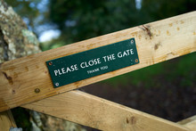 Please Close The Gate Sign On A Public Footpath In The English Countryside.
