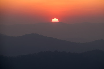 Sticker - The sun rises and the sun sets at Pilok sub-district, Kanchanaburi province, Thailand.