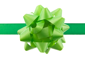 Green ribbon and green bow Isolated on a white background close-up.