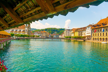  Chapel Bridge With Flowers in City of Lucerne and Reuss River in Switzerland.