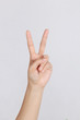 © Endriyana - peace symbol using the left hand
