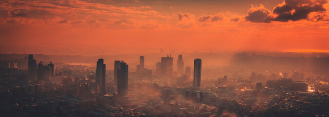 Wall Mural - Foggy aerial and artistic ciew from Istanbul during sunset