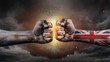 © JustLife - Argentina vs UK. Fists with flags. Battle of two countries on sky.