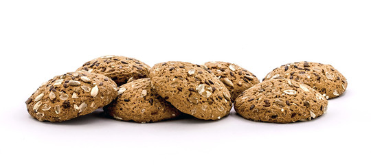 Delicious oatmeal cookies with sunflower seeds on a white isolated background_