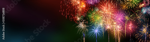 Colorful fireworks with wide dark copy space Wallpaper Mural