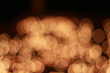 Wall Mural - Bokeh of the candle on the golden mounth