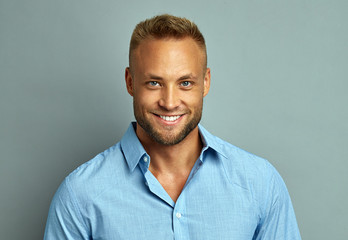 Wall Mural - Handsome smiling man with white teeth