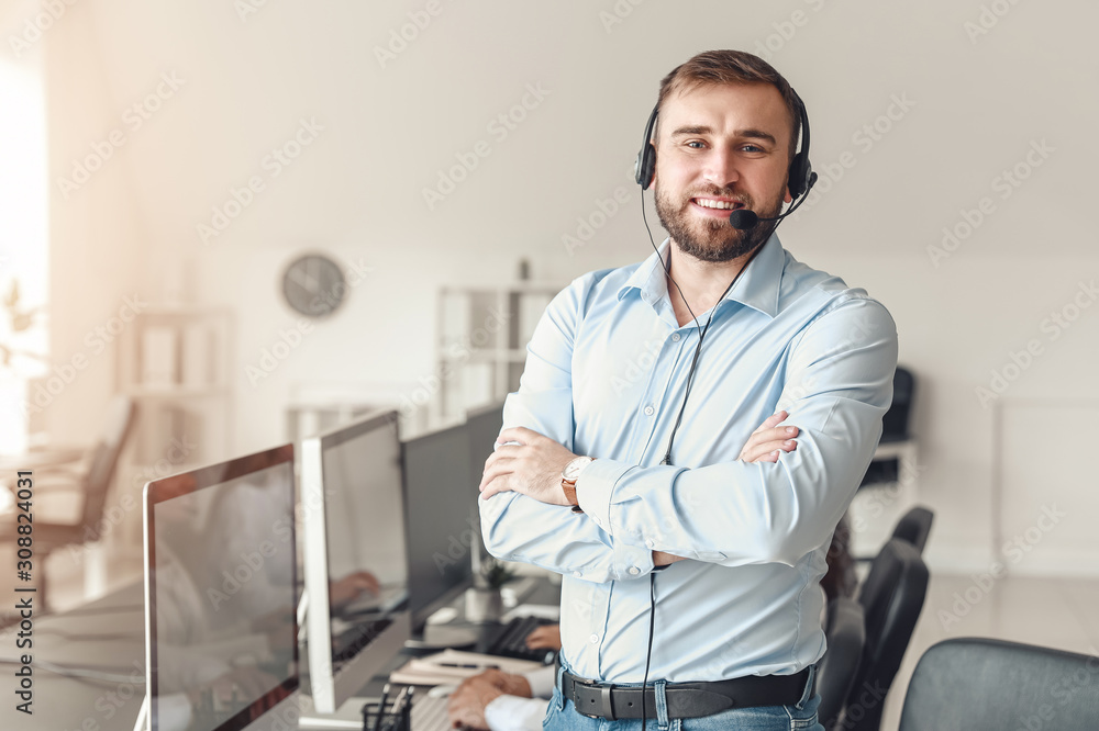 Portrait of male technical support agent in office - obrazy, fototapety, plakaty 