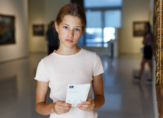 Wall Mural - Teenage girl visiting museum