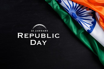 Indian republic day concept. Indian flag with the text Happy republic day against a blackboard background. 26 January.