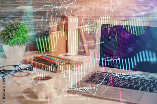 Fotomural Financial graph colorful drawing and table with computer on background