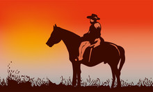 Cowboy On Horse Ride On Sunset. Mountains On The Horizon