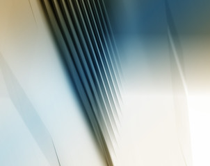 Abstract business modern city urban futuristic architecture background, motion blur, reflection in glass of high rise skyscraper facade, toned blue picture with bokeh. Real estate concept