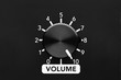 © Cagkan - Volume control knob of a black amplifier on maxiumum loudness