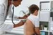© lordn - Doctor examining child with stethoscope. Respiratory disease diagnostics and treatment