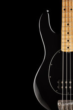 Black Electric Bass Guitar On Black Background