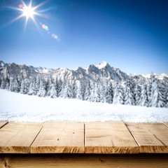 Table background of free space and landscape of winter window. 