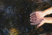 Hand In Water Stream