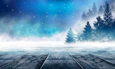 Winter background. Winter snow landscape with wooden table in front.