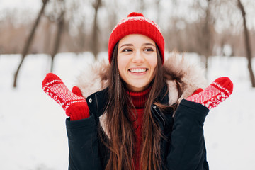 Poster - smiling woman having fun in winter park