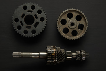 Sticker - top view of aged gears on black surface