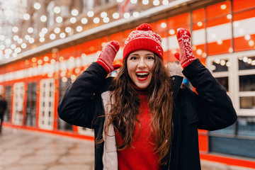 Wall Mural - woman having fun in Christmas street