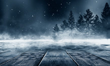 Winter Background. Winter Snow Landscape With Wooden Table In Front. Dark Winter Forest Background At Night. Snow, Fog, Moonlight. Dark Neon Night Background In The Forest With Moonlight.
