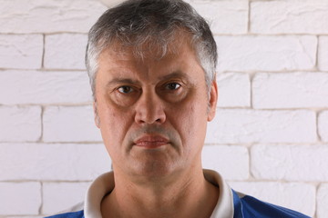 Poster - male portrait of a 50 year old man closeup