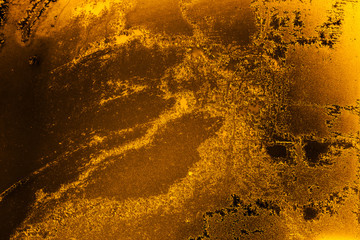 Wall Mural - Abstract ice textured background in amber